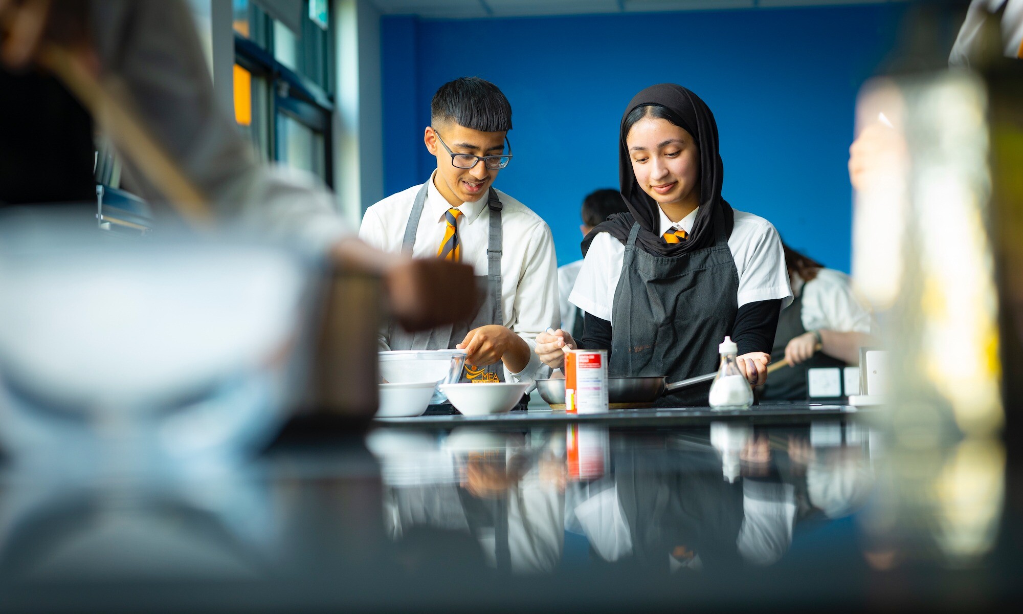 MEA Central pupils participating in a food tech class